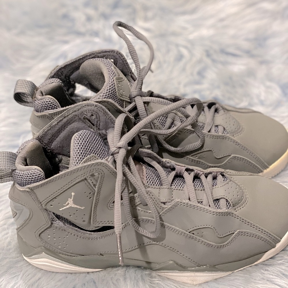 Dark gray Jordan True Flight size 5Y, equivalent to a size 6.5 in women’s.